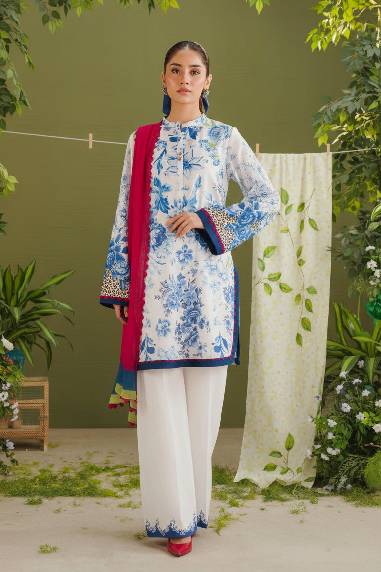 A fashion catalog page showing a model wearing a three-piece printed ethnic suit from Zara Shahjahan's 'Coco Prints' collection, specifically the 'Aero-6A' design. The model is on the left against a green background, while the right side features product details, text, and a QR code on a white background.