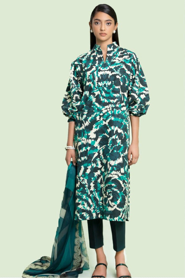 Sapphire Daily 3-piece printed lawn suit sewing pattern cover featuring a model wearing a green and blue patterned kurta, trouser, and dupatta against a pale green background.