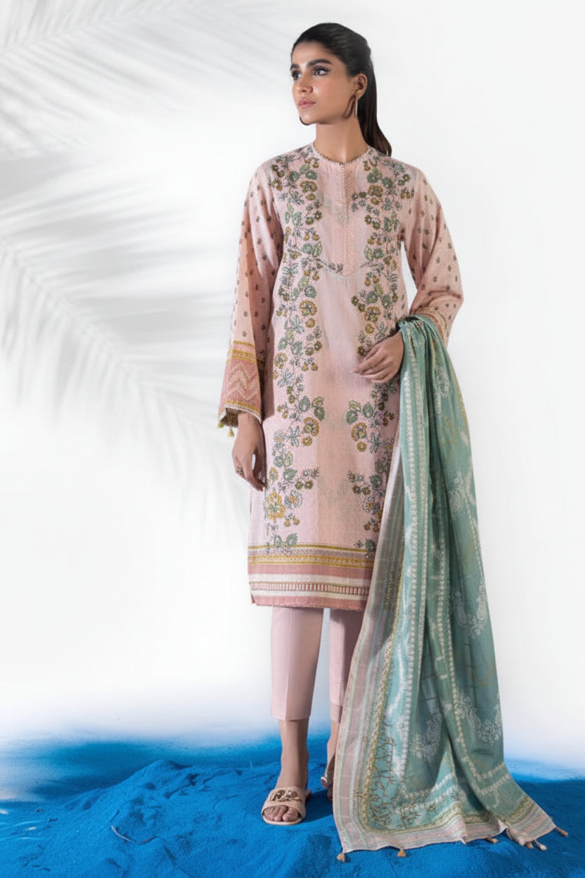 Sapphire Daily 3-piece printed lawn suit sewing pattern cover, featuring a model wearing a beige kurta with green and pink floral prints, a light green salwar, and a matching dupatta.