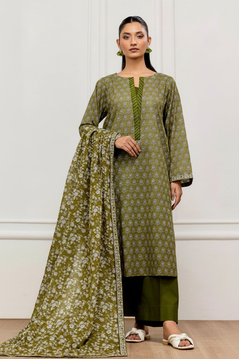 A catalog page for the brand Orient showing a women's unstitched collection in kait green. The page features two models wearing matching printed kurta and trouser sets, one shown from the front and the other from the side/back.