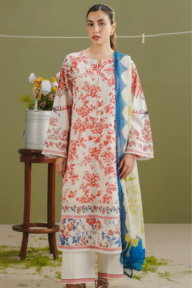 A model wearing a three-piece printed ethnic suit from ZARA SHAHJAHAN COCO, featuring a cream kurta with red floral patterns, white trousers, and a blue patterned dupatta, shown alongside product details on a white background.