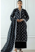 A catalog page for the brand Orient showing a model wearing a long printed black and white kurta set in two views: front and back. The page includes text describing the collection, garment details, color as black, and care instructions.