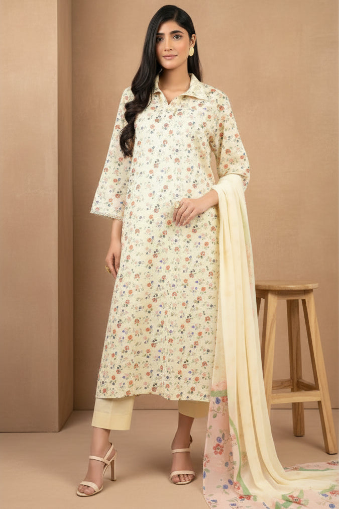 A woman modeling a Bareezé printed three-piece unstitched suit in a light cream color with a small multicolor floral pattern, shown alongside product details and care instructions on a white background.