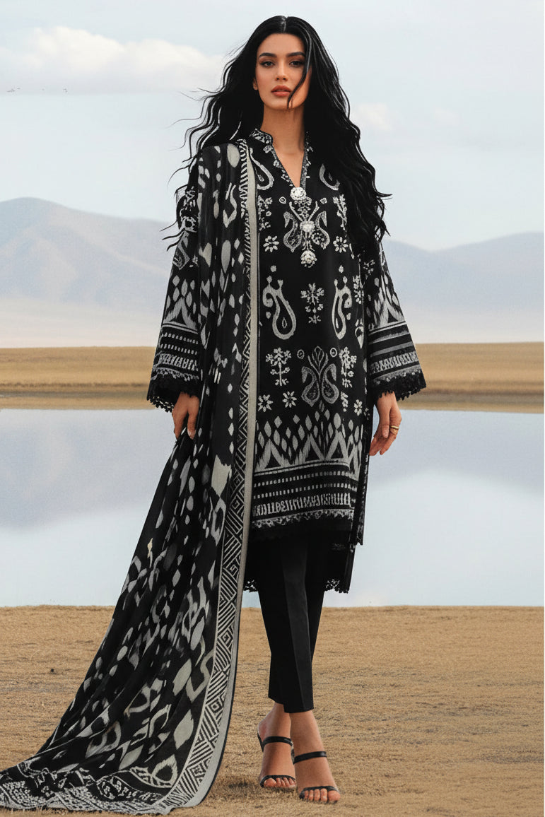 A model wearing a three-piece women's ethnic wear set from Bonanza Satrangi's 'Bohemian Vibe' collection, featuring a black and white digital printed kurta, dupatta, and trousers, set against a desert landscape background. The right side of the image contains product details and care instructions.